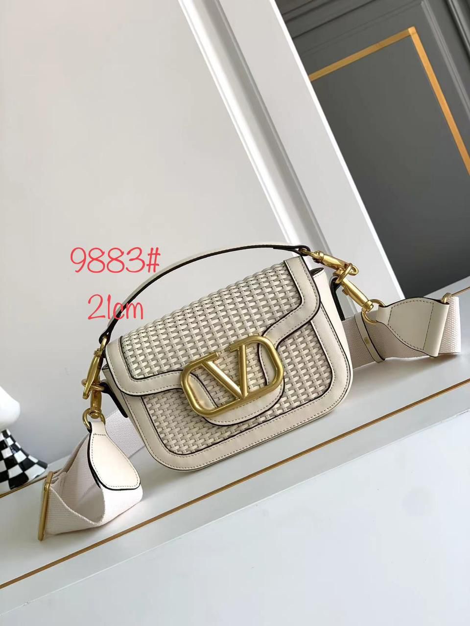 Valentino Garavani VLogo Woven Leather Shoulder Bag