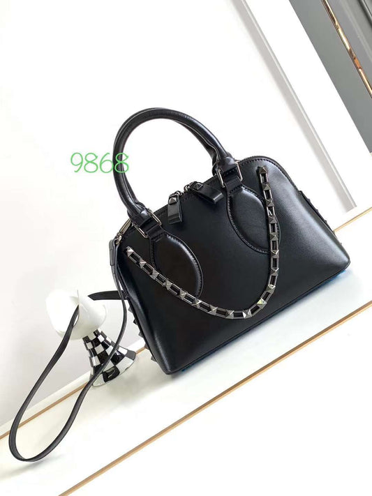 Valentino Garavani Rockstud Top Handle Leather Bag