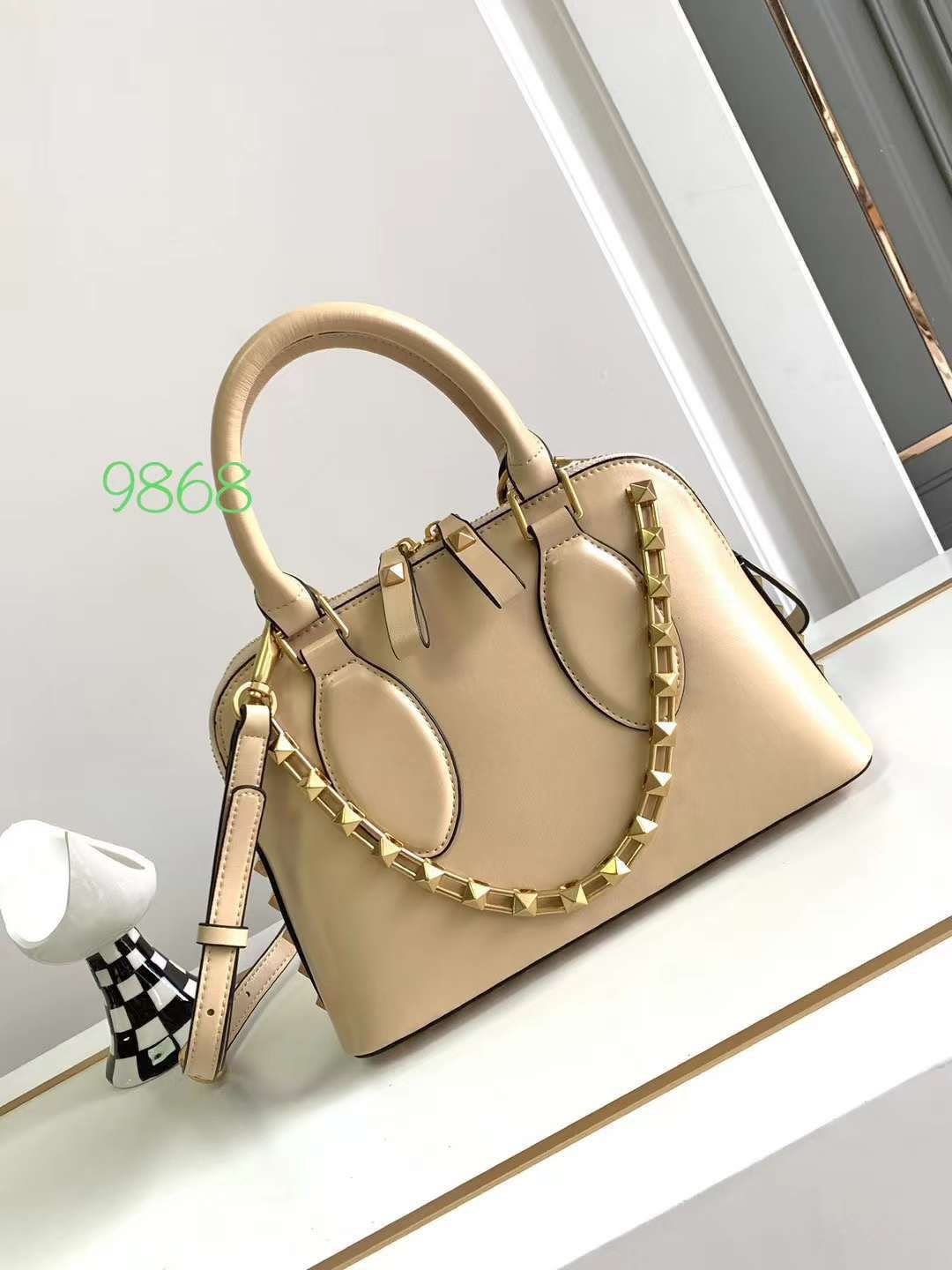 Valentino Garavani Rockstud Top Handle Leather Bag