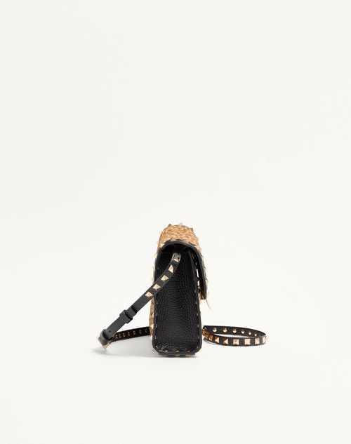 Valentino Garavani Rockstud small shoulder bag in pony-effect calfskin with animal print